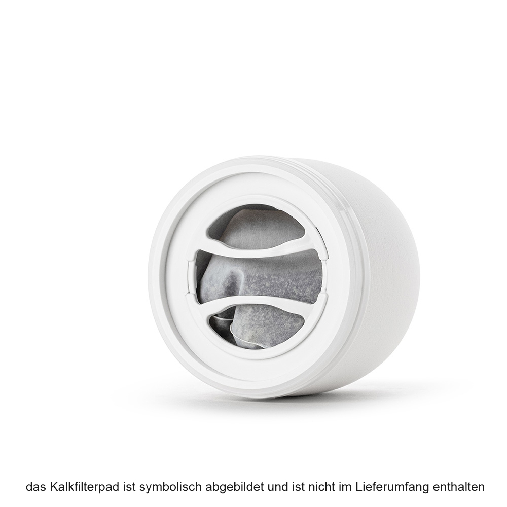 Unterseite eines weißen Keramik-Vorfilters, in den zur Kalkfilterung ein rundes Pad eingelegt ist.